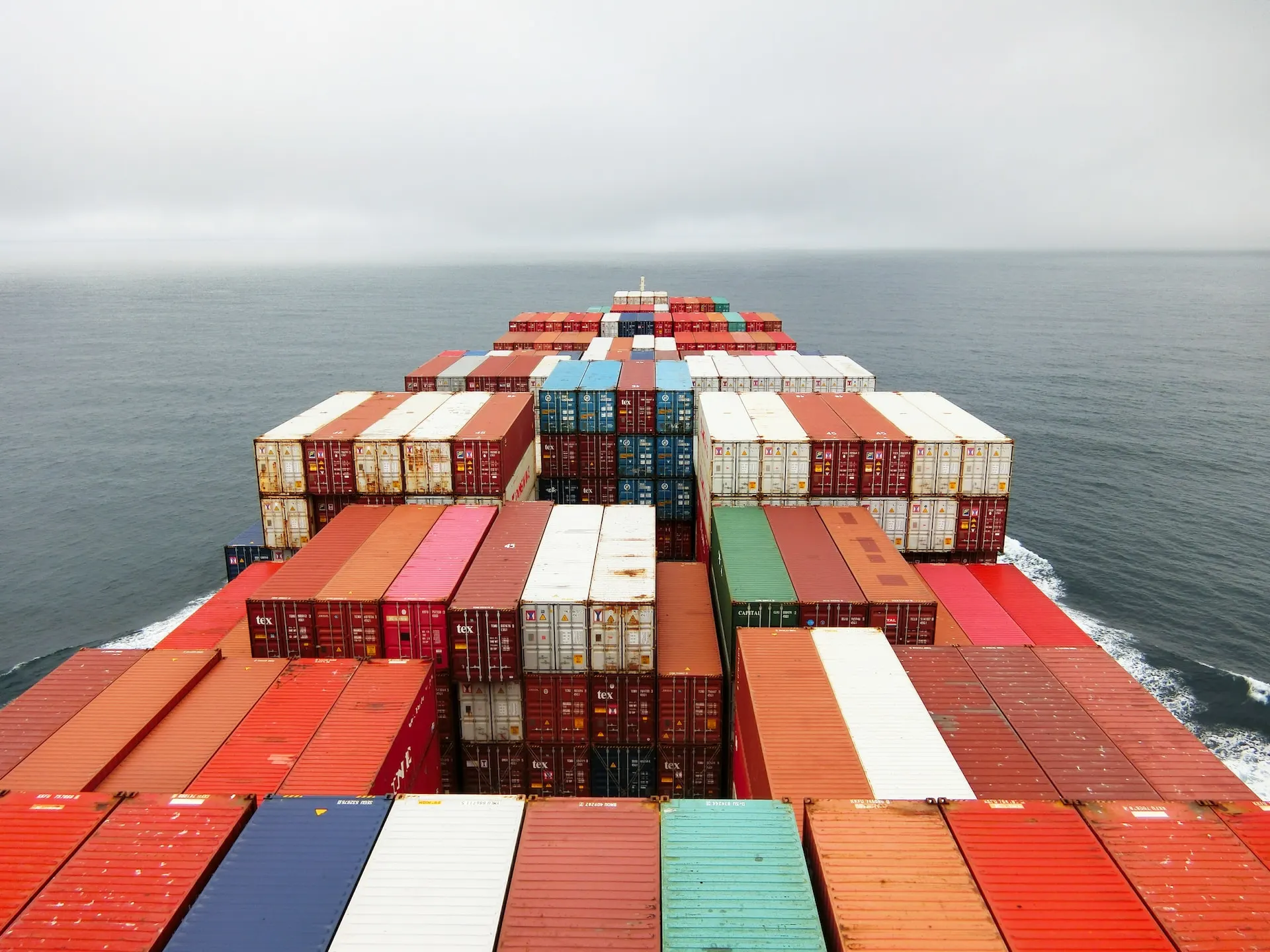 view from the bridge of a container ship somewhere in the middle of the ocean